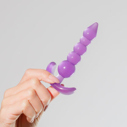 Dop anal flexibil Crushious Draco, mov, 12cm lungime, 4 margele progresive - Amoroso